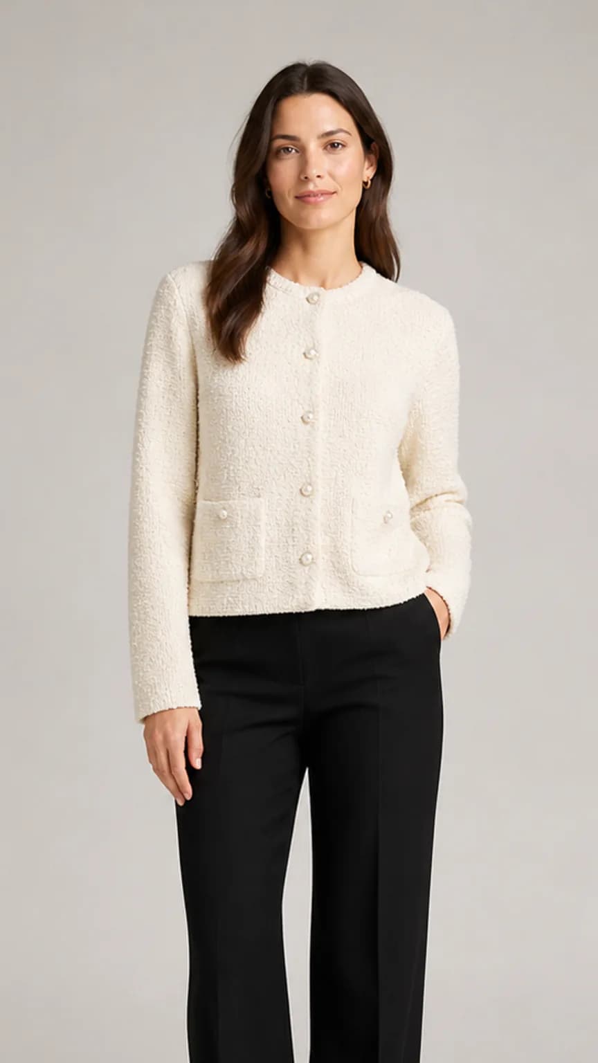 Adult female model wearing the same cream boucle cardigan